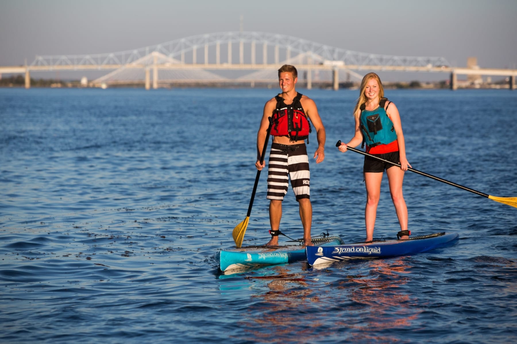 couple paddleboarding